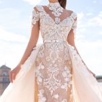 koronkowa brzoskwiniowa suknia slubna