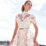 koronkowa brzoskwiniowa suknia slubna