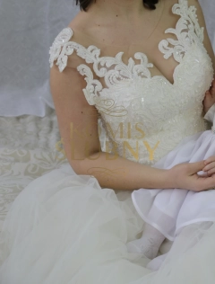 Kremowa suknia ślubna princess