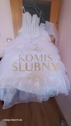 Sprzedam suknię ślubną - rozmiar -xs/s, piękna , jak nowa, gorset z glębokim dekoltem + dól spodnica /księżniczkowa na kole, plus nażutka .