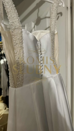 Sprzedam  klasyczną satynową suknię ślubną z kieszonkami rozmiar XS 