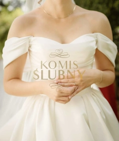 Sprzedam elegancką suknię ślubną z trenem